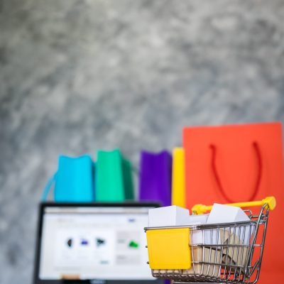 laptop and shopping bags, online shopping concept.